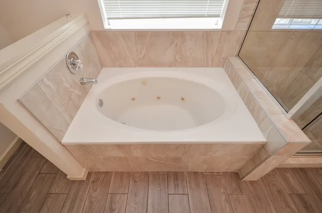 a bathroom with a bathtub