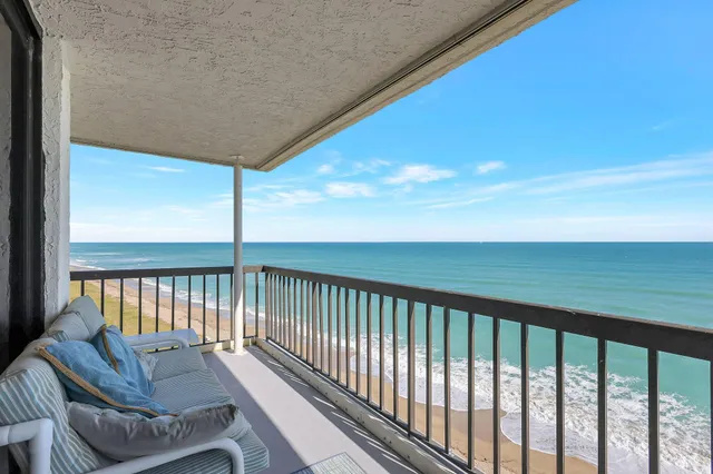 a balcony with furniture
