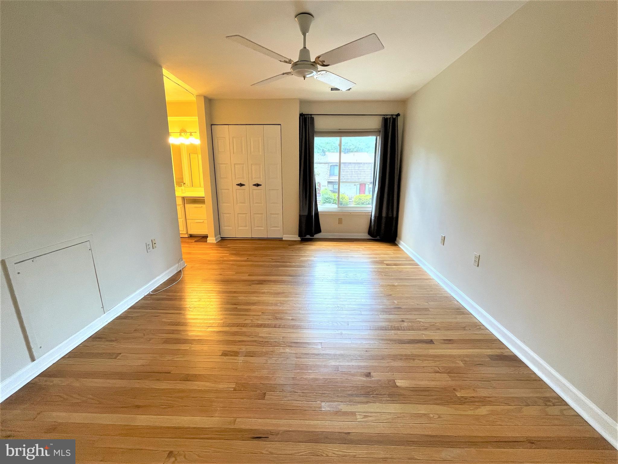 8072 Inverness Ridge Road Potomac, MD 20854 - Photo 22 of 38 Master bedroom w hardwood flr & ceiling fan