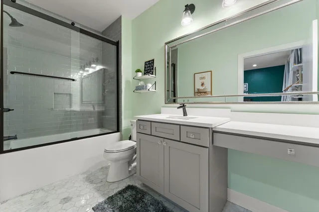 a spacious bedroom with a large bed and a window