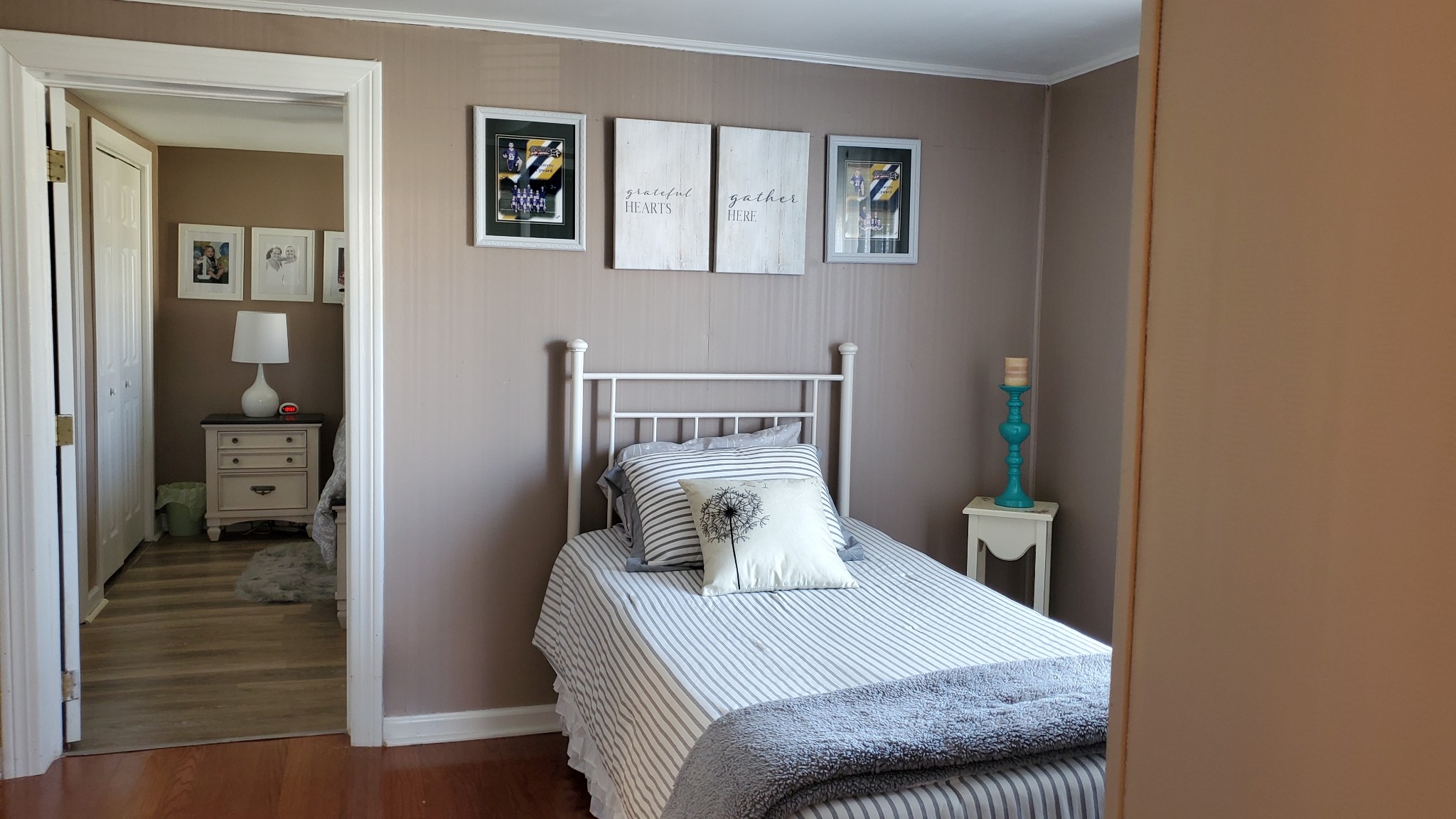 2073 Fall River Road Leoma, TN 38468 - Photo 17 of 44 a bedroom with a bed and wooden floor