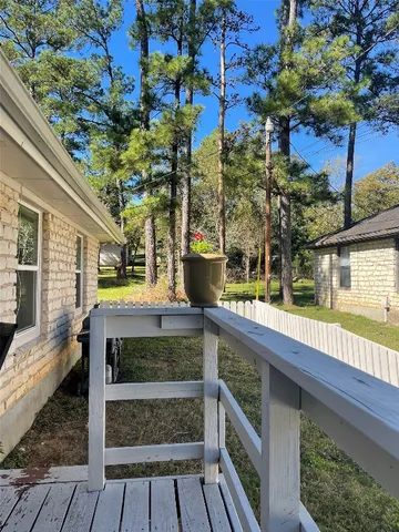 a view of outdoor sitting area with furniture