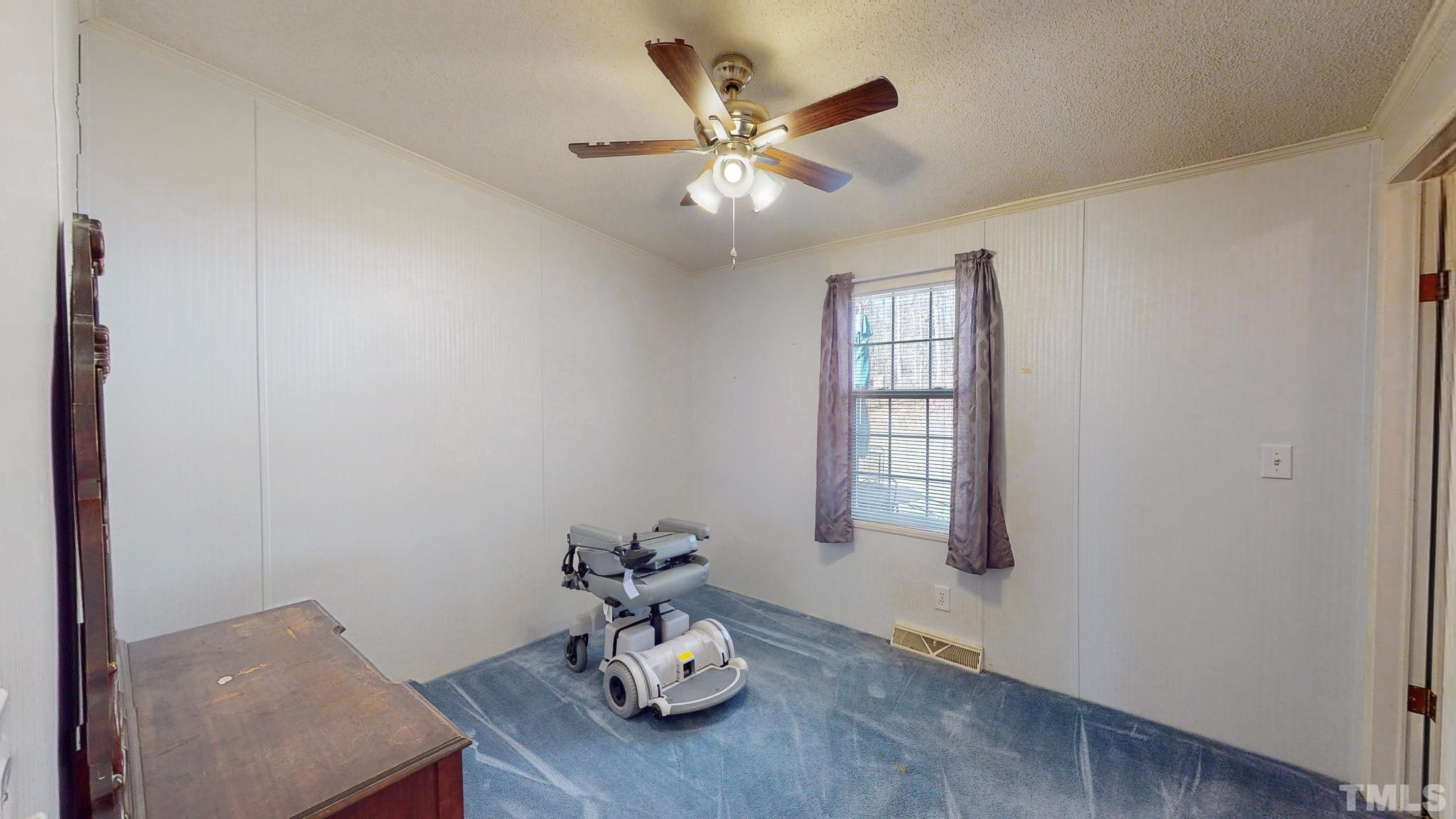 214 Hassel Clayton Road Roxboro, NC 27574 - Photo 31 of 38 a dining room with furniture and window