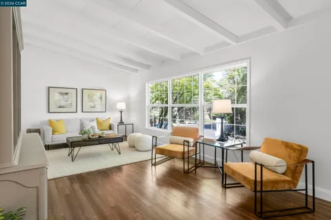 a view of livingroom with furniture and wooden floor