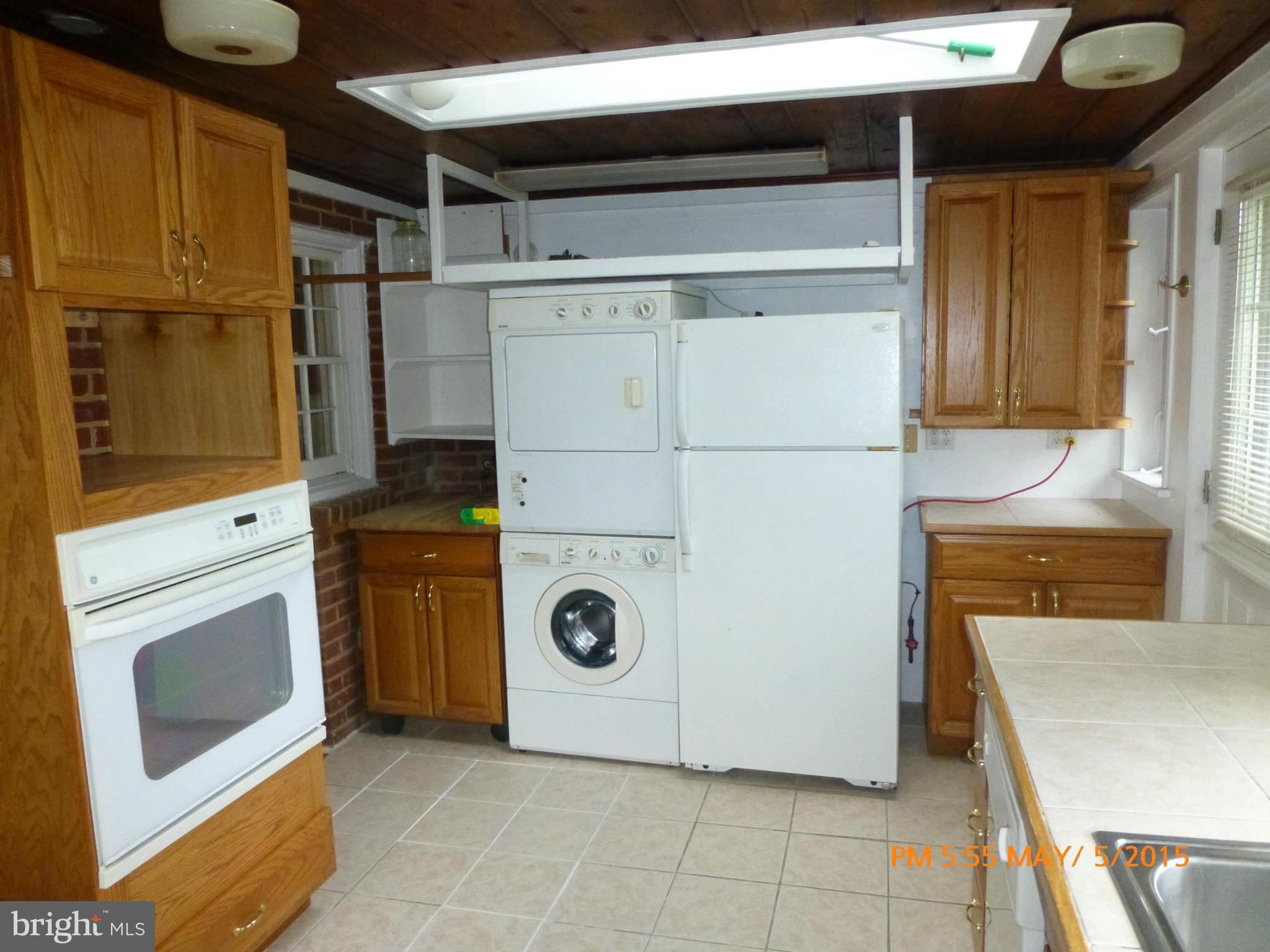 11921 Andrew Street Silver Spring, MD 20902 - Photo 5 of 18 Laundry in Kitchen