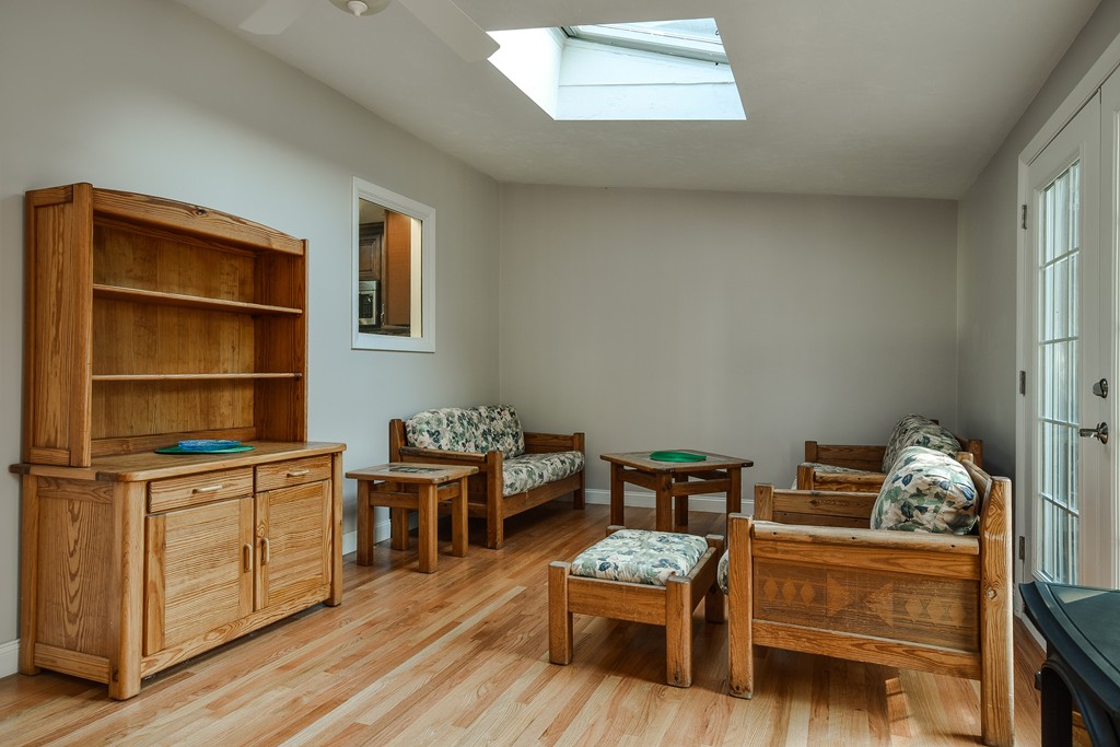 18 Gary Road Needham, MA 02494 - Photo 11 of 29 a living room with furniture and wooden floor