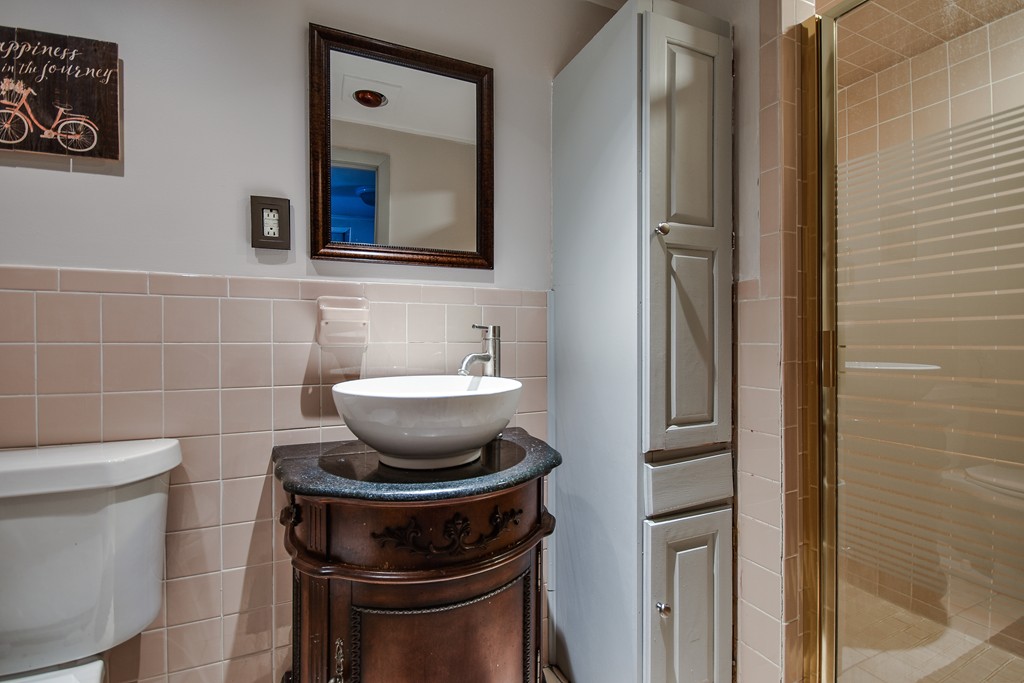 18 Gary Road Needham, MA 02494 - Photo 16 of 29 a bathroom with a toilet and a sink