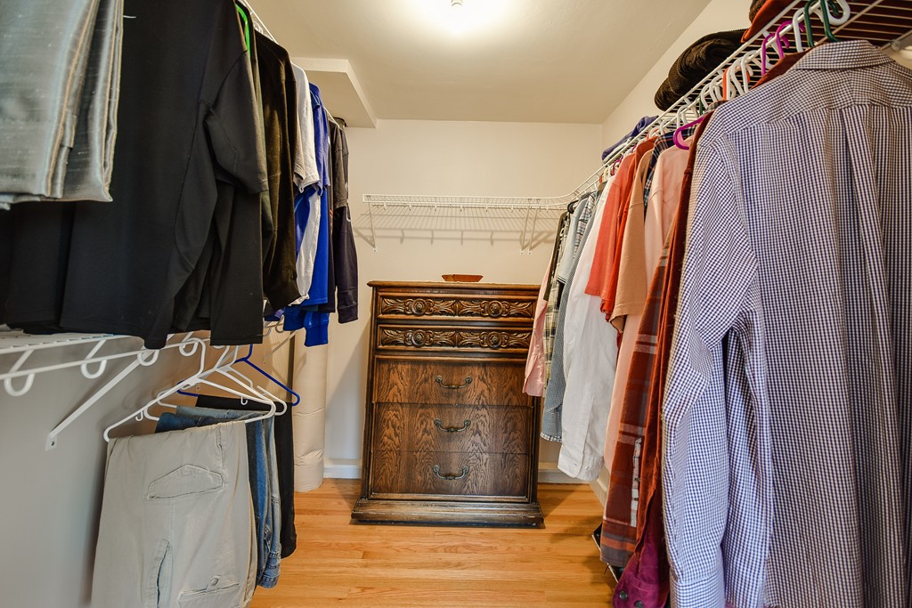 18 Gary Road Needham, MA 02494 - Photo 20 of 29 a view of walk in closet with clothes