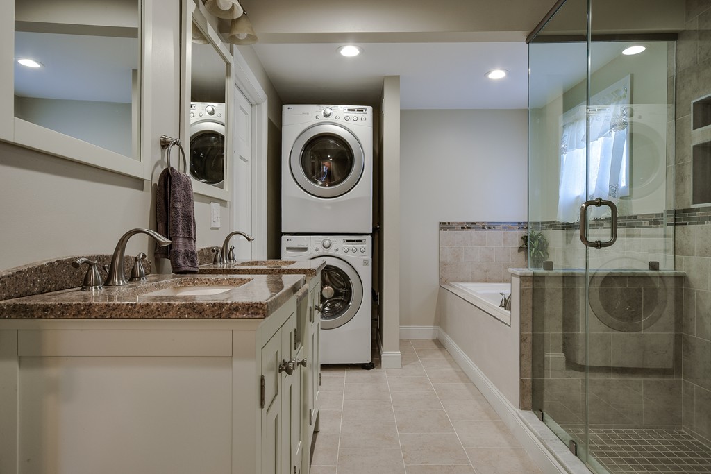 18 Gary Road Needham, MA 02494 - Photo 22 of 29 a utility room with sink dryer and washer