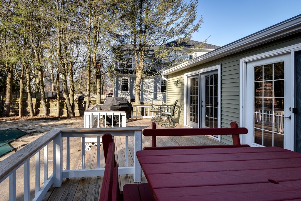 18 Gary Road Needham, MA 02494 - Photo 25 of 29 a view of a brick house with many windows
