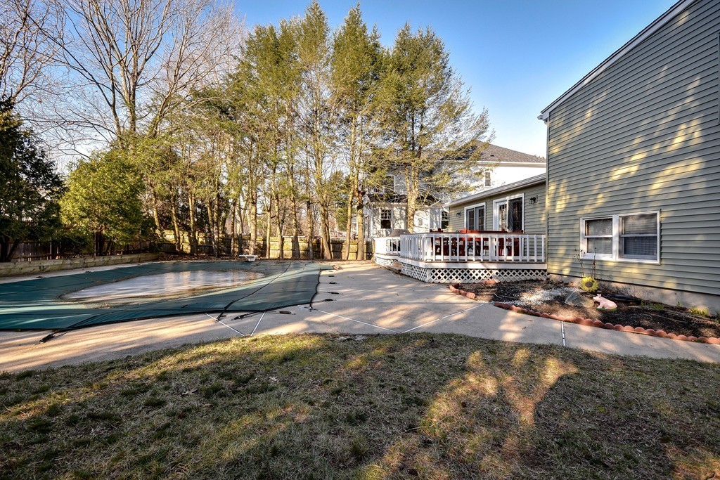 18 Gary Road Needham, MA 02494 - Photo 27 of 29 a front view of a house with a yard