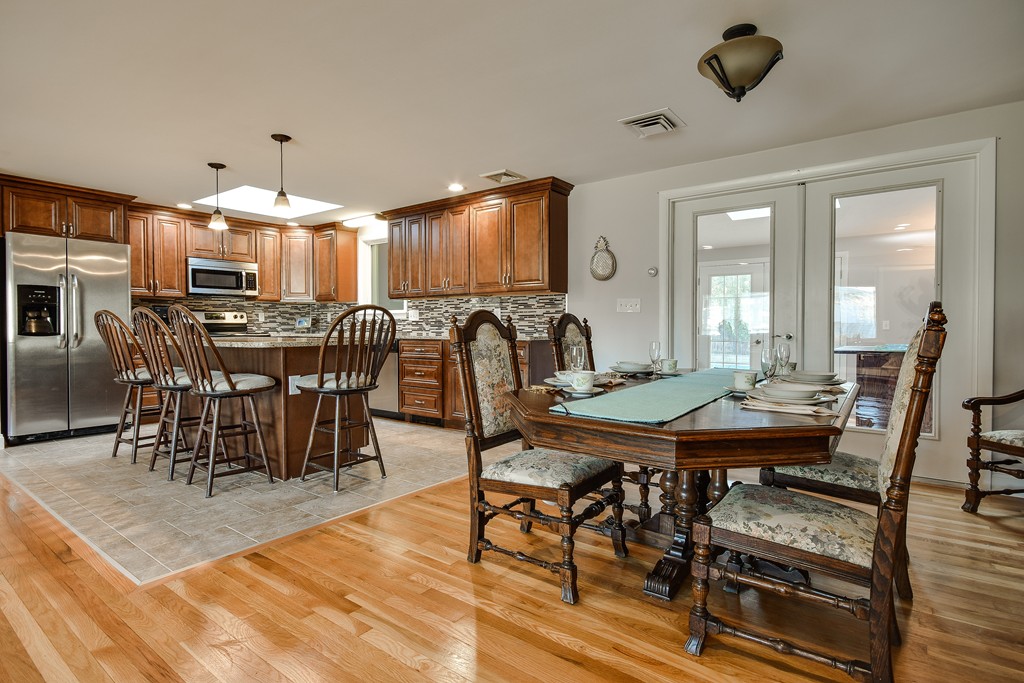 18 Gary Road Needham, MA 02494 - Photo 4 of 29 a view of a dining room with furniture