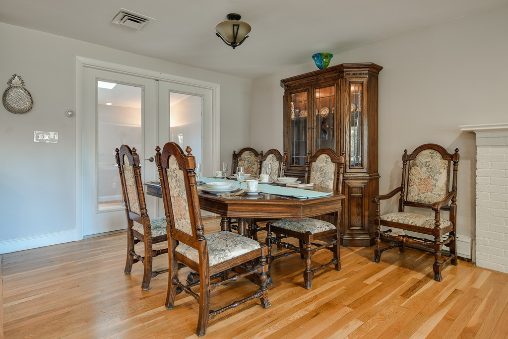 18 Gary Road Needham, MA 02494 - Photo 5 of 29 a dining room with furniture and wooden floor
