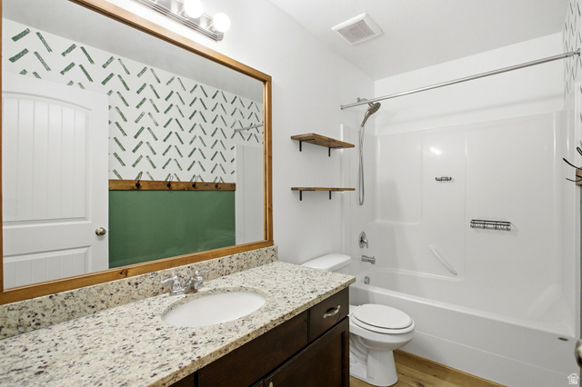 664 South Saddle Road Grantsville, UT 84029 - Photo 16 of 39 Main floor bathroom with large vanity.