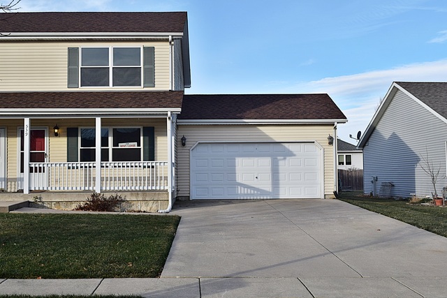 539 Elizabeth Street Maple Park, IL 60151 - Photo 1 of 25 a front view of a house with a yard