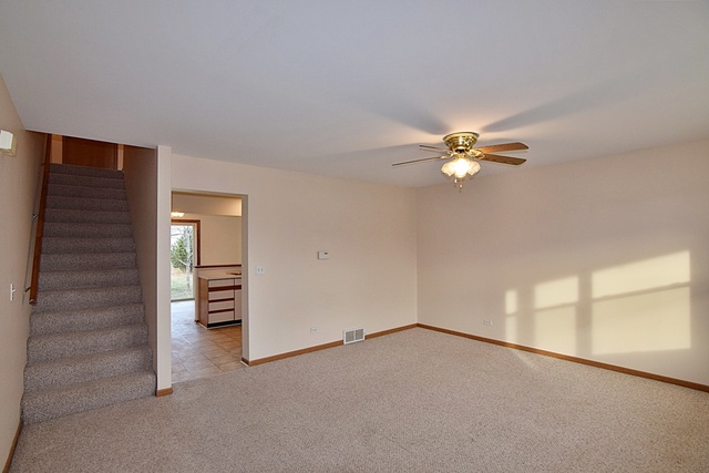539 Elizabeth Street Maple Park, IL 60151 - Photo 2 of 25 a view of an empty room with a window