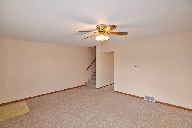 539 Elizabeth Street Maple Park, IL 60151 - Photo 5 of 25 a view of a chandelier fan in a room