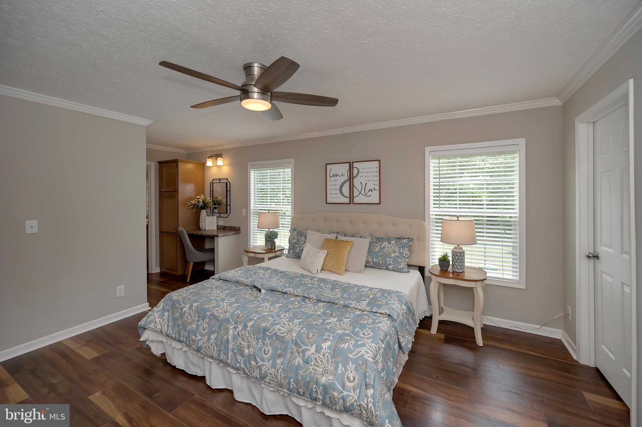 7238 Blanton Road Ruther Glen, VA 22546 - Photo 20 of 41 Primary suite with crown molding.