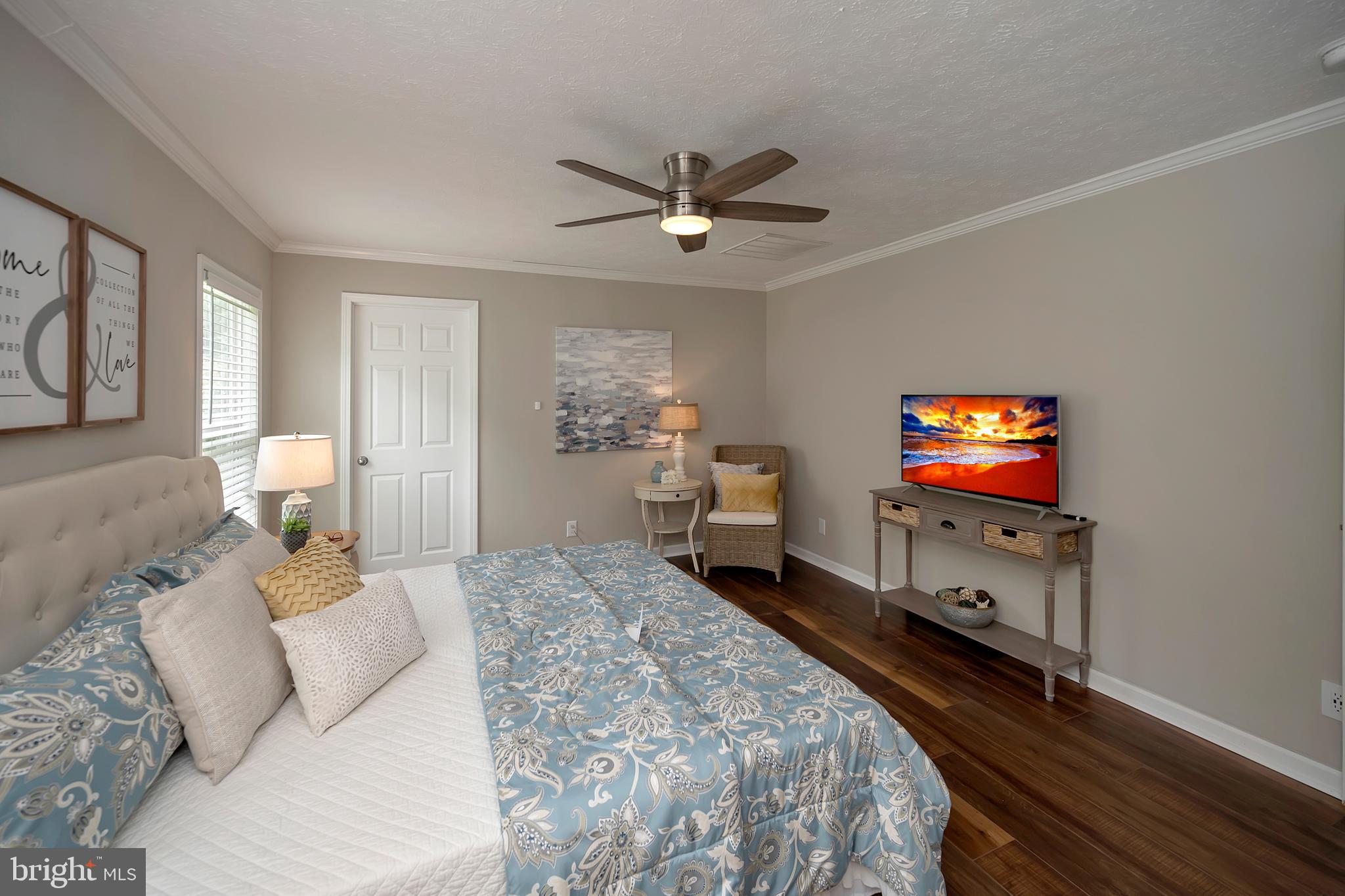 7238 Blanton Road Ruther Glen, VA 22546 - Photo 23 of 41 Primary suite w/ 2 walk-in closets & ceiling fan.
