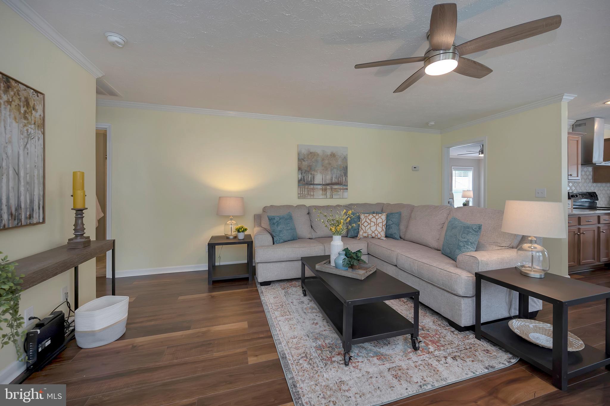 7238 Blanton Road Ruther Glen, VA 22546 - Photo 3 of 41 Inviting family room with crown molding.