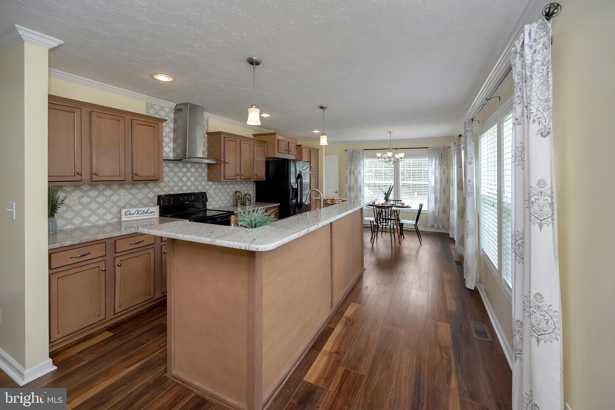 7238 Blanton Road Ruther Glen, VA 22546 - Photo 7 of 41 Kitchen opens to dining area and family room,