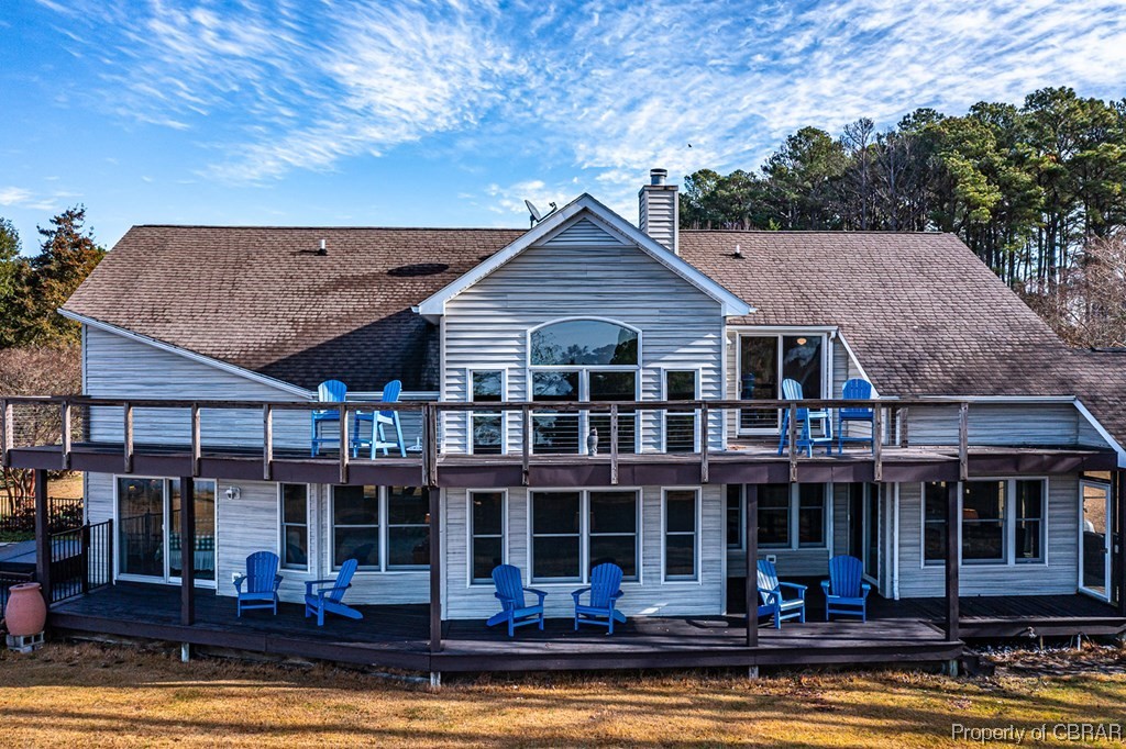 362 Beach Creek Road Lancaster, VA 22503 - Photo 3 of 47 Rear view of house with a wooden deck