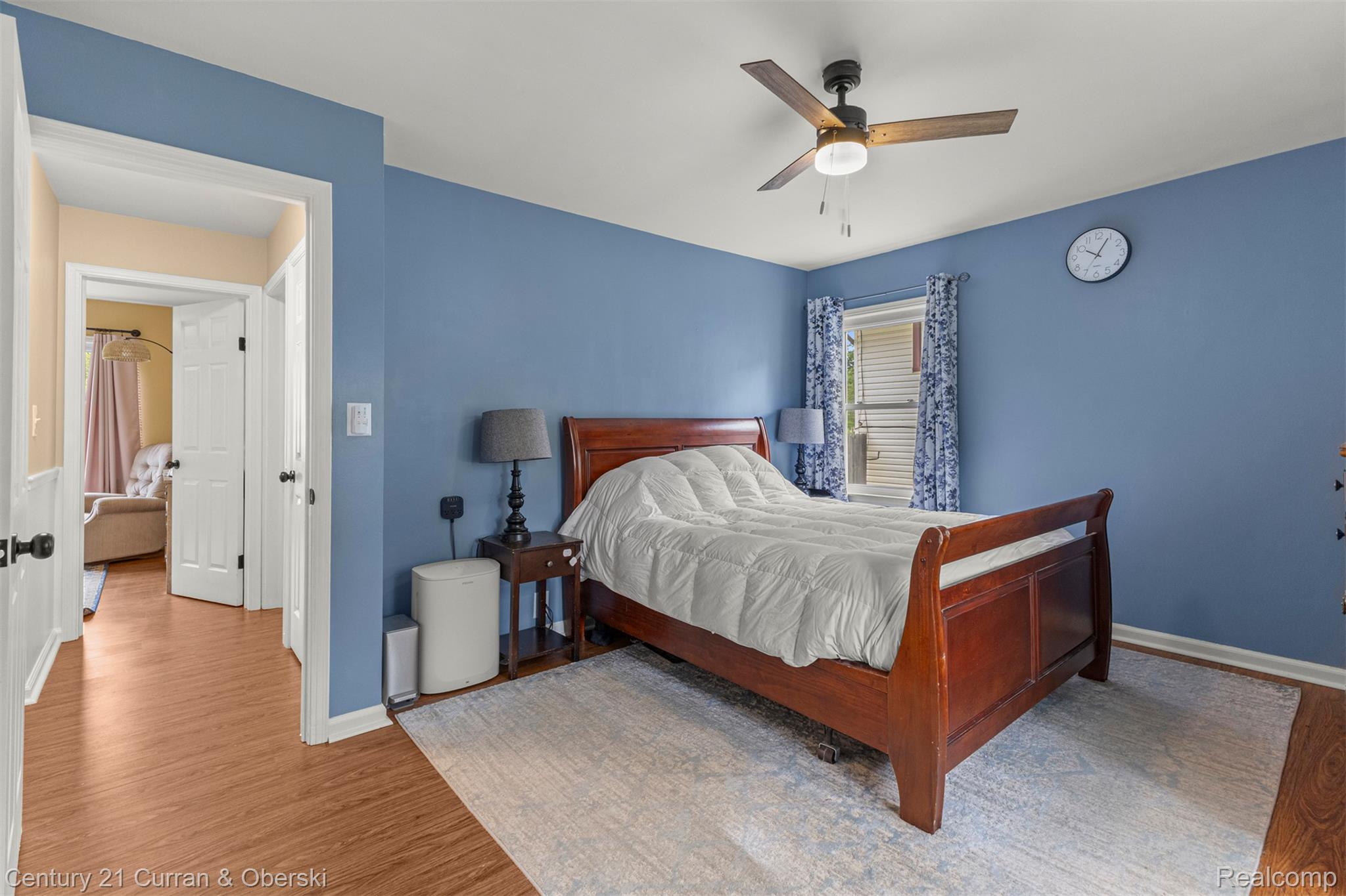 411 South Adrian Street Tecumseh, MI 49286 - Photo 23 of 61 Bedroom featuring wood finished floors and ceiling fan