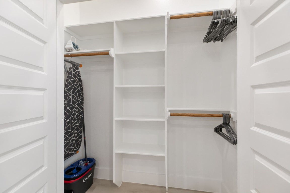 3514 Noah Street, Unit B Houston, TX 77021 - Photo 11 of 13 a view of walk in closet with clothes and shoes