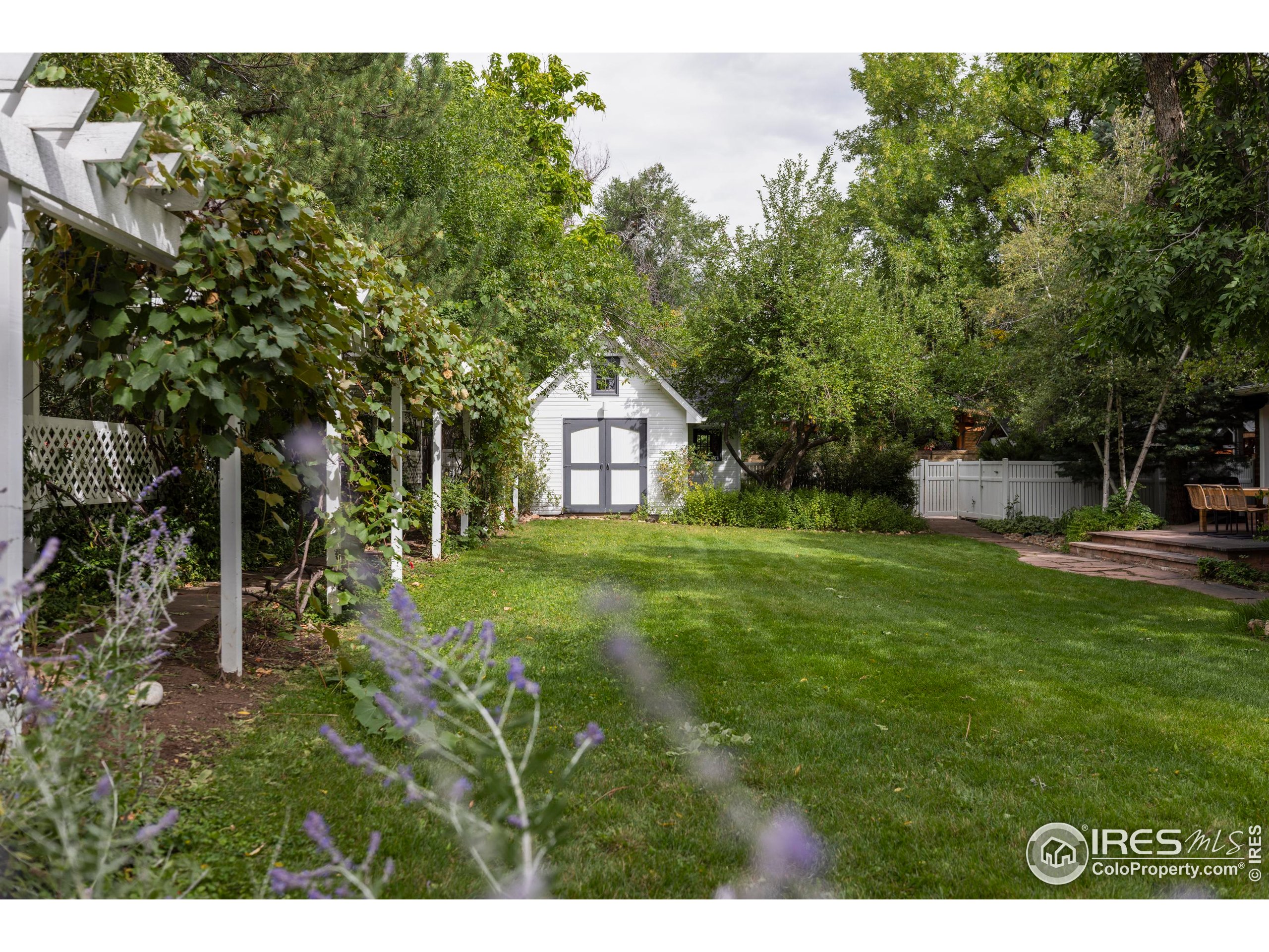1070 Juniper Avenue Boulder, CO 80304 - Photo 25 of 32 a house view with a garden space