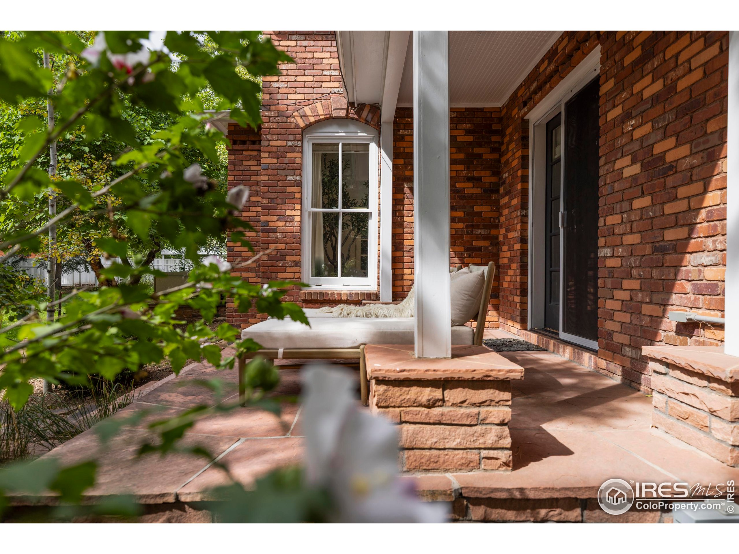 1070 Juniper Avenue Boulder, CO 80304 - Photo 28 of 32 a front view of a house with a yard