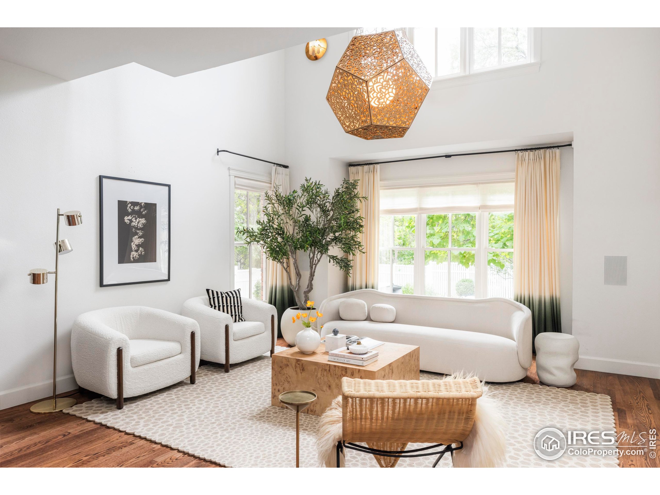 1070 Juniper Avenue Boulder, CO 80304 - Photo 3 of 32 a living room with furniture and a large window