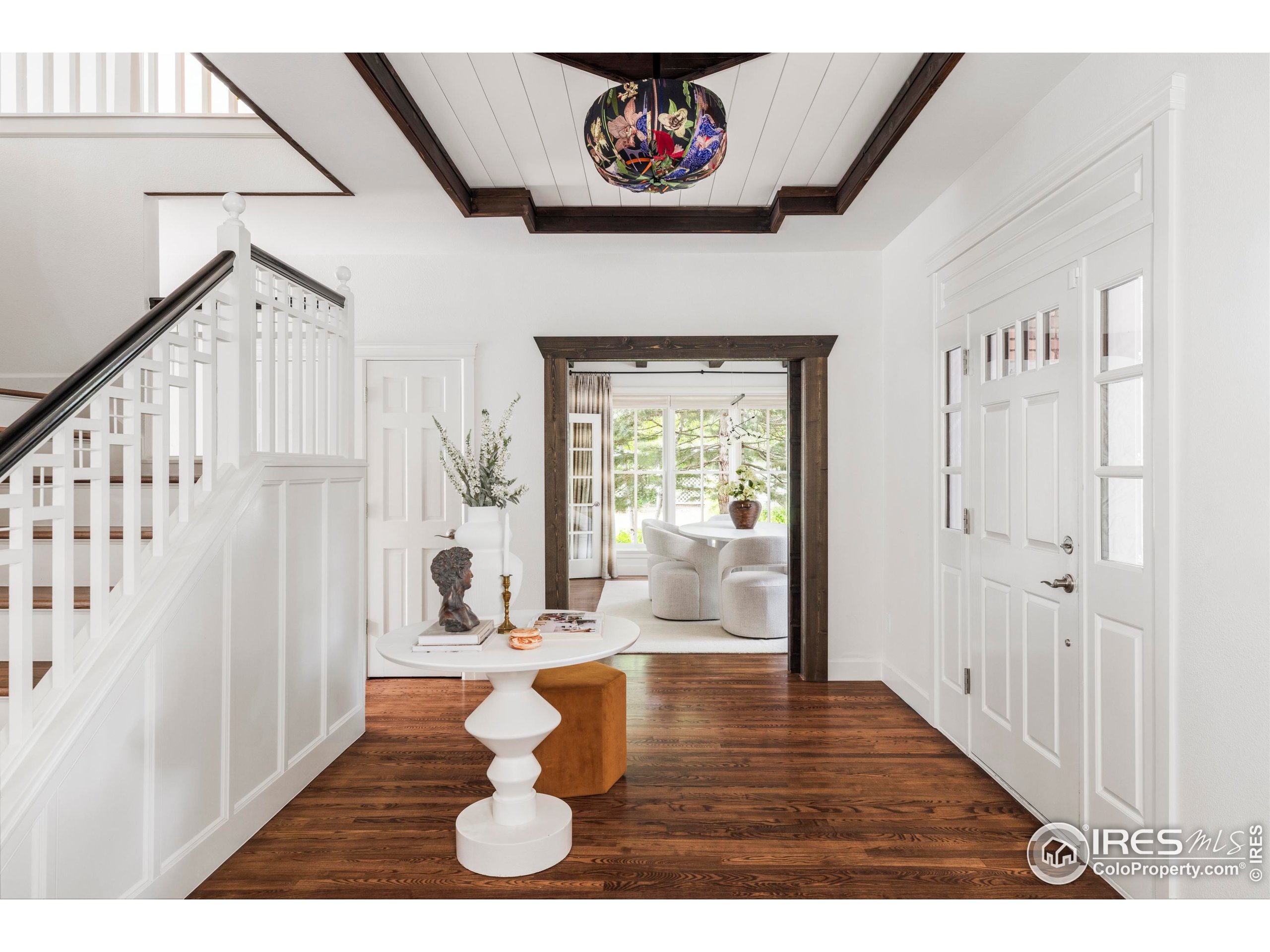 1070 Juniper Avenue Boulder, CO 80304 - Photo 4 of 32 a view of an entryway with wooden floor
