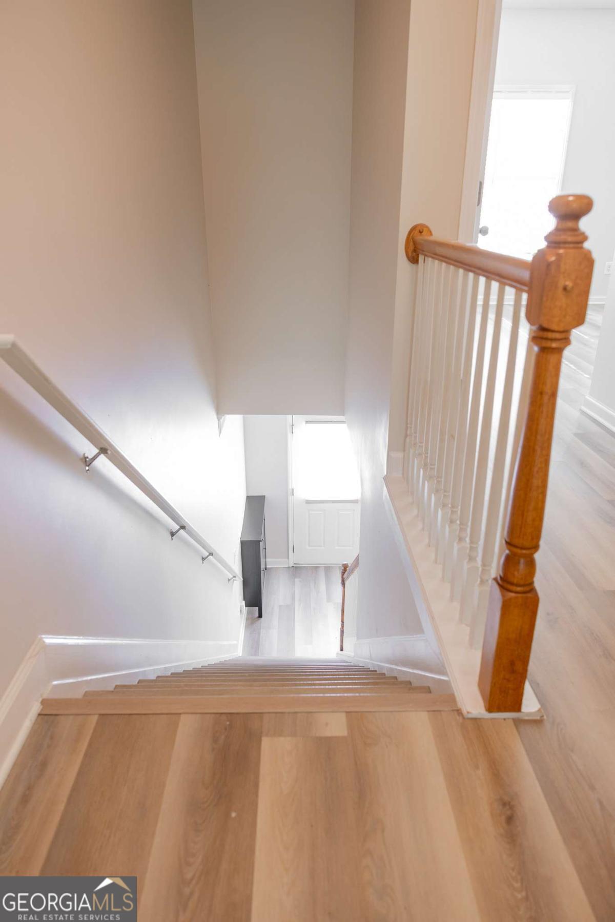 1232 Harris Commons Place, Unit 1232 Roswell, GA 30076 - Photo 20 of 21 a view of a living room with a window