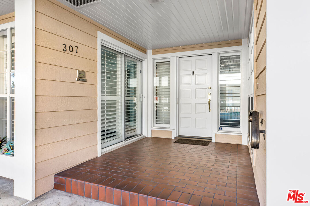 4342 Redwood Avenue, Unit C307 Marina del Rey, CA 90292 - Photo 2 of 48 a view of wooden door