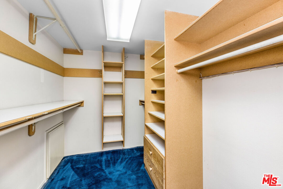 4342 Redwood Avenue, Unit C307 Marina del Rey, CA 90292 - Photo 25 of 48 a view of walk in closet with empty racks