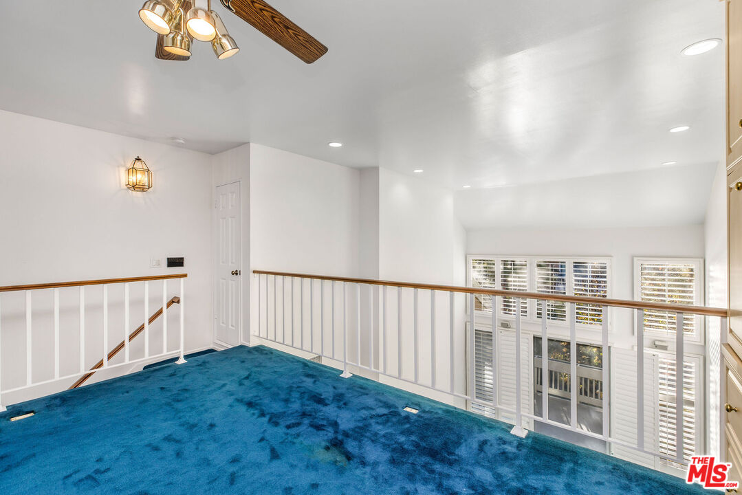 4342 Redwood Avenue, Unit C307 Marina del Rey, CA 90292 - Photo 31 of 48 a view of a hallway with wooden floor