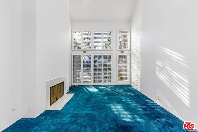 a view of a livingroom with a fireplace