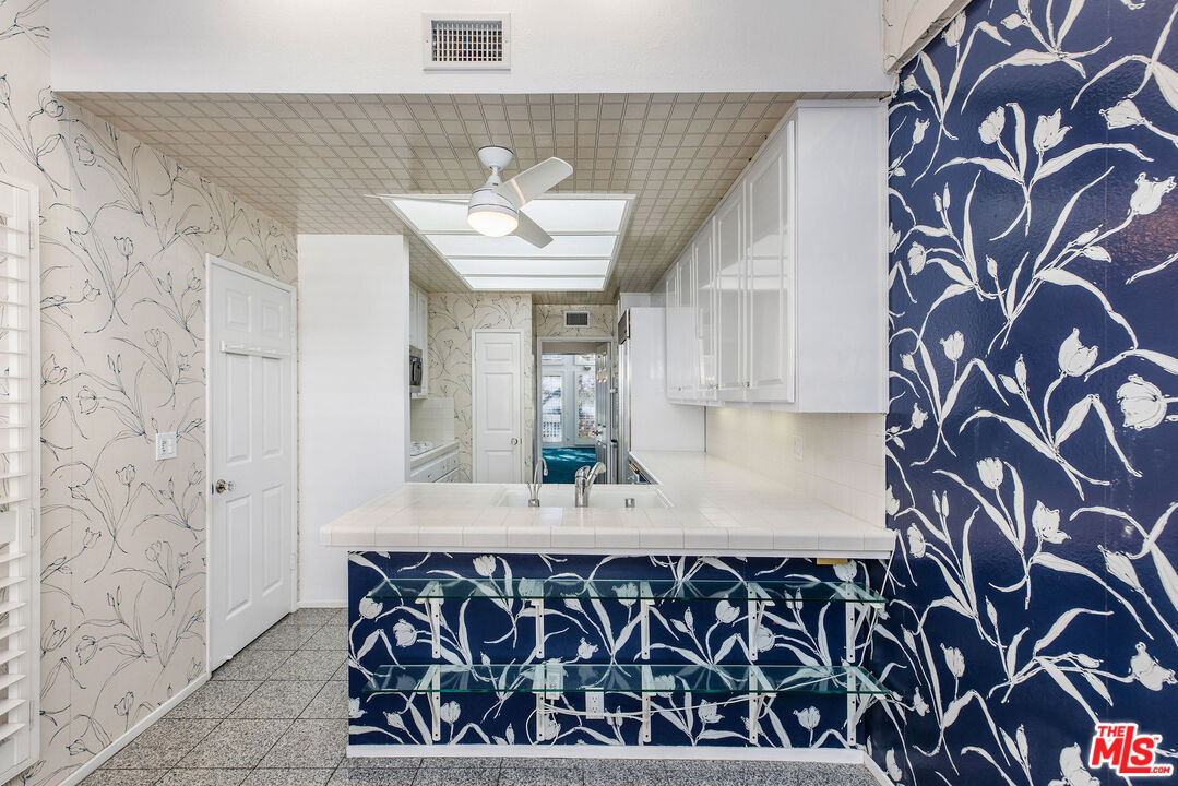 4342 Redwood Avenue, Unit C307 Marina del Rey, CA 90292 - Photo 10 of 48 a bathroom with a sink and a mirror