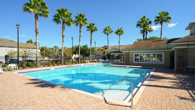 a view of a house with a swimming pool