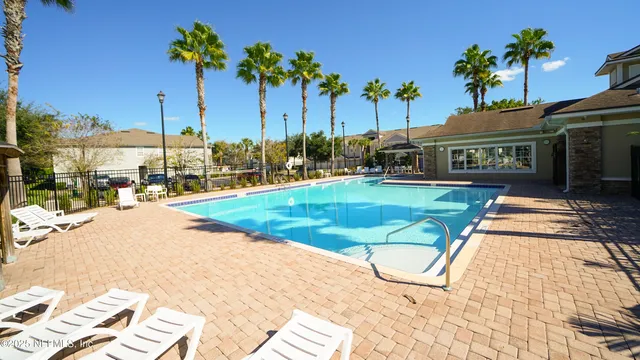 a view of a backyard with a patio