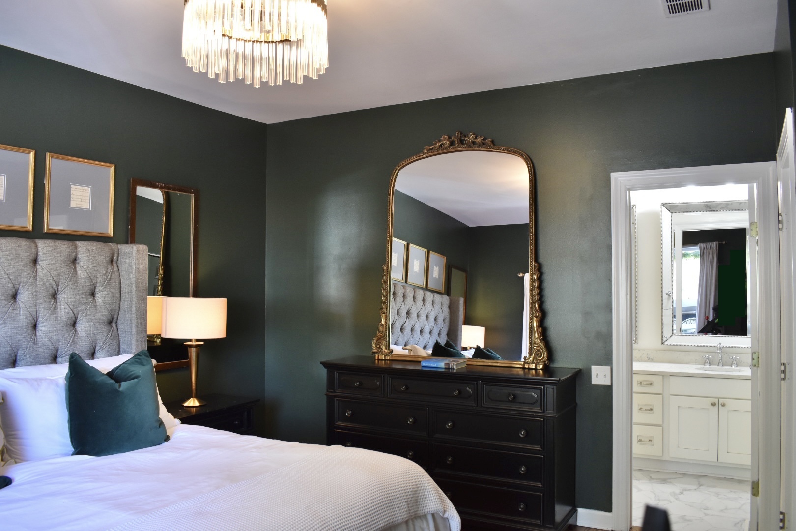4315 North Kenmore Avenue, Unit 2S Chicago, IL 60613 - Photo 17 of 27 a bedroom with a bed and a mirror on dresser
