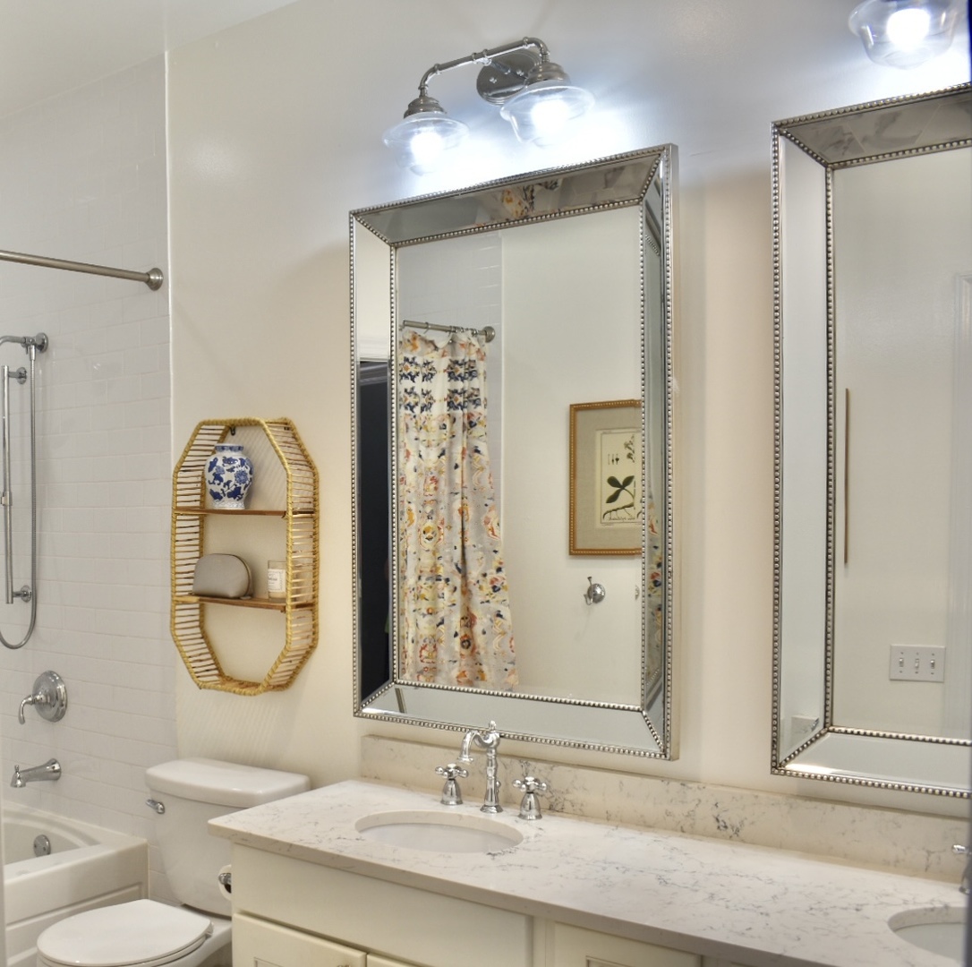 4315 North Kenmore Avenue, Unit 2S Chicago, IL 60613 - Photo 18 of 27 a bathroom with a toilet a sink and a mirror