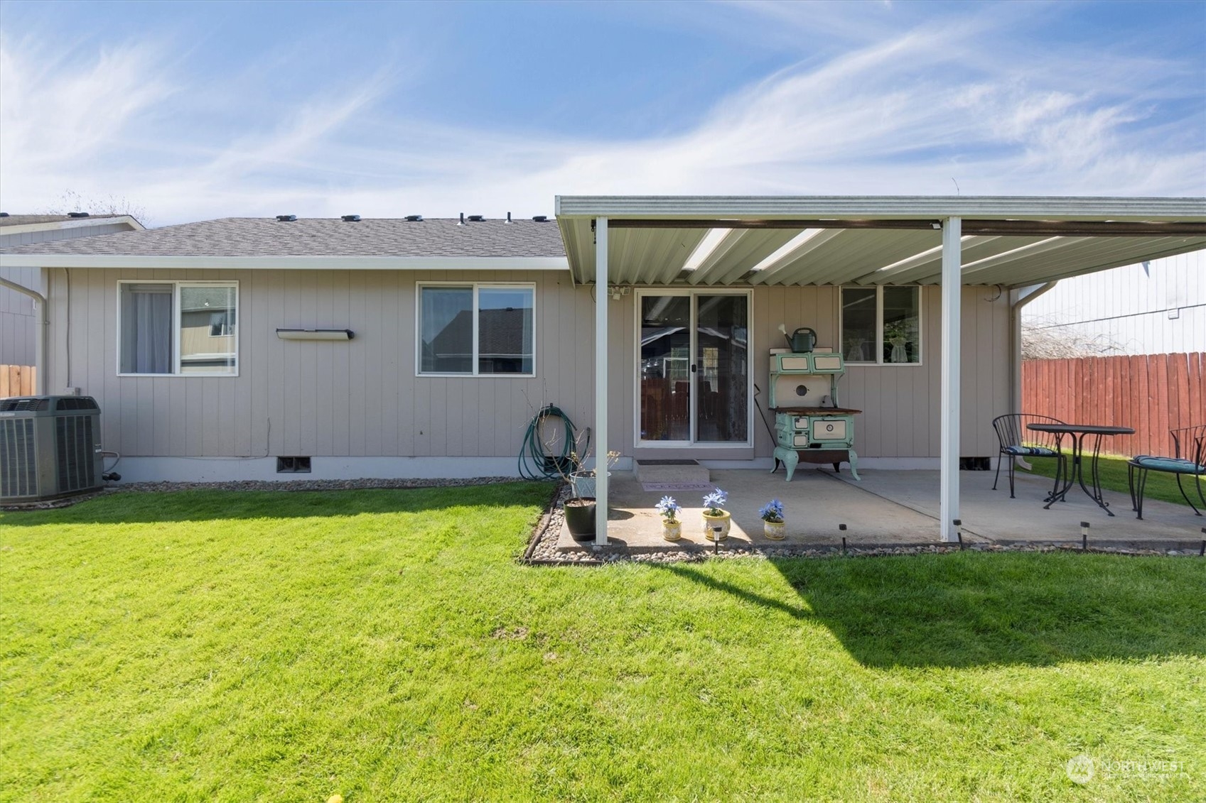 119 Abbey Road Kelso, WA 98626 - Photo 11 of 27 a view of a backyard with a patio