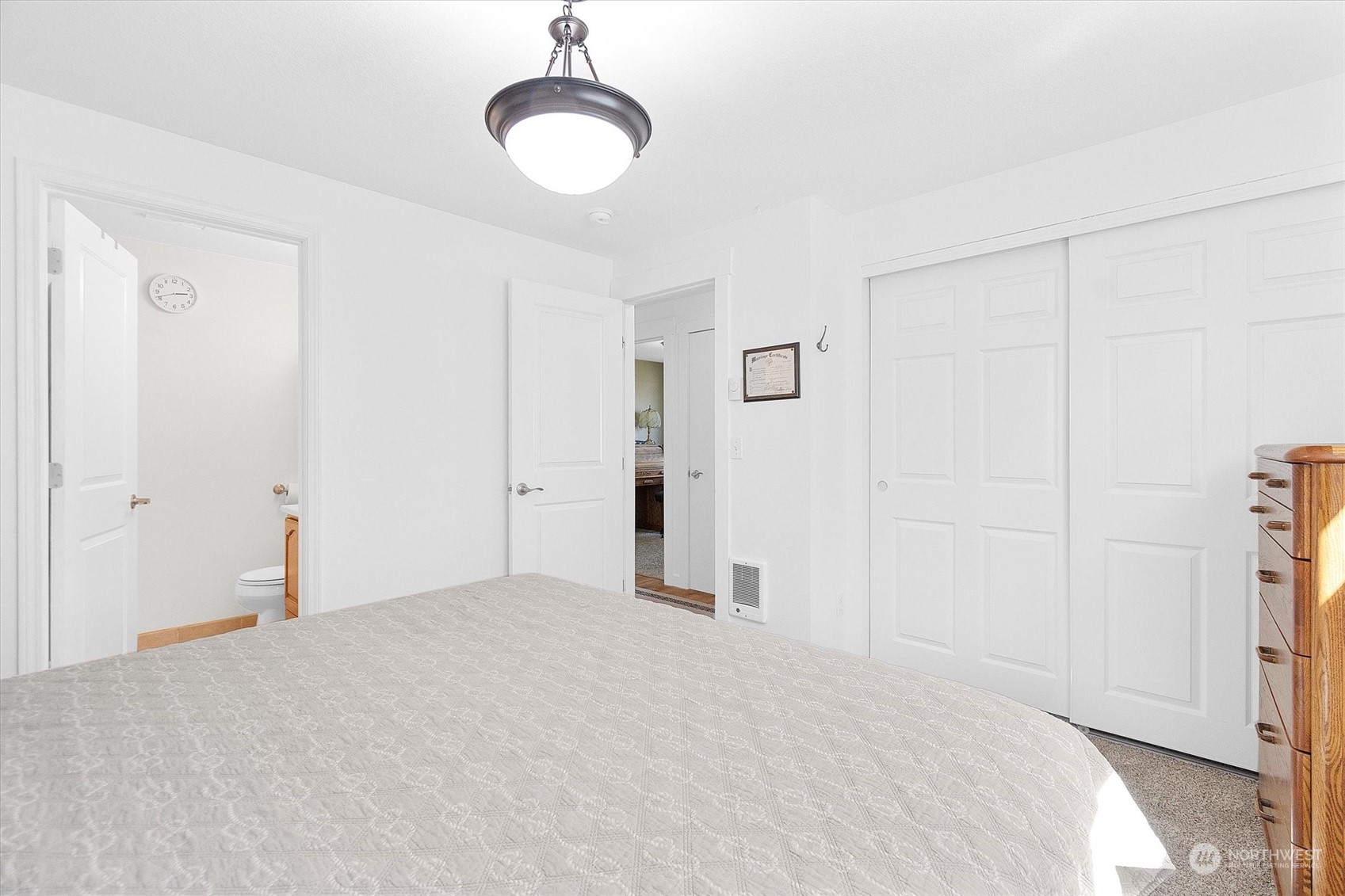 119 Abbey Road Kelso, WA 98626 - Photo 26 of 27 a bedroom with a bed and cabinets