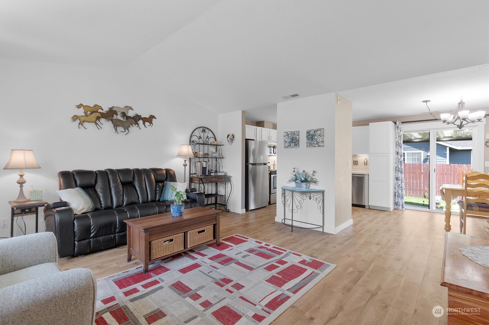 119 Abbey Road Kelso, WA 98626 - Photo 3 of 27 a living room with furniture and wooden floor