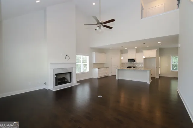 a view of a kitchen with furniture and a fireplace