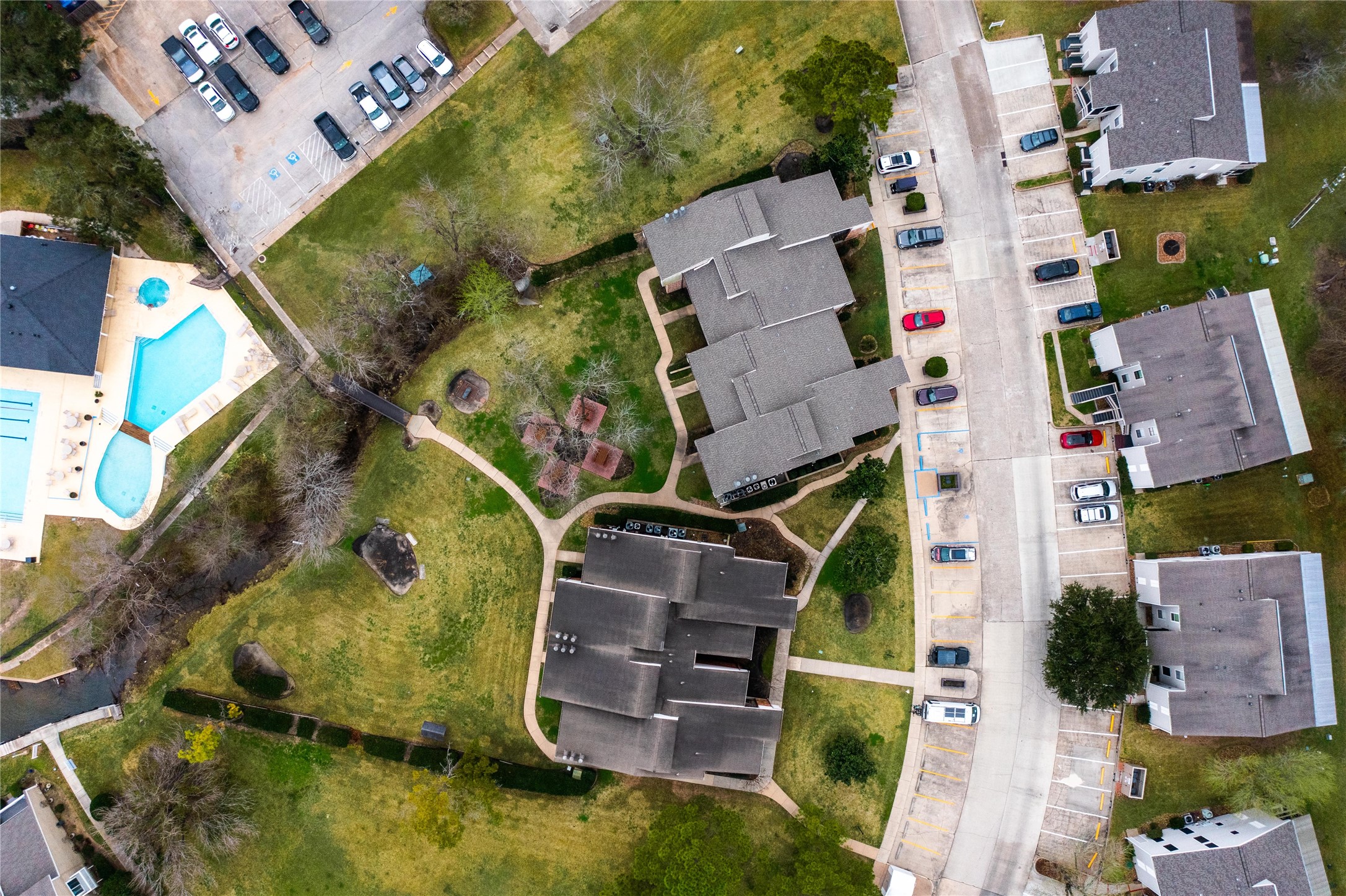 1000 April Sound Boulevard Conroe, TX 77356 - Photo 3 of 46 an aerial view of a house with a yard and pool