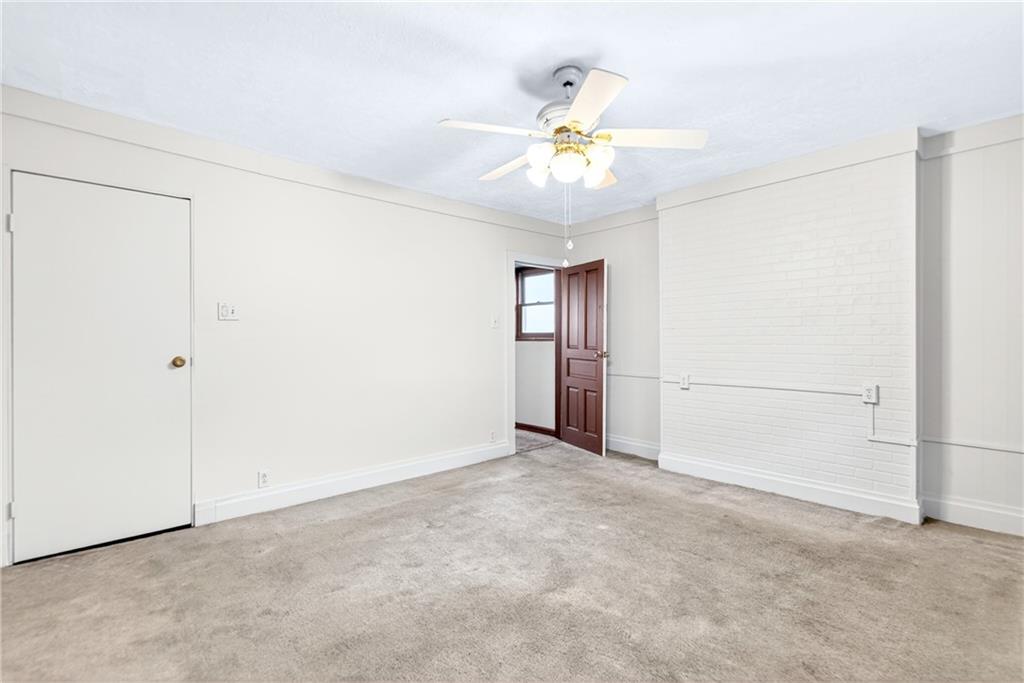 520 Stokes Avenue Braddock, PA 15104 - Photo 16 of 47 a view of an empty room with a window