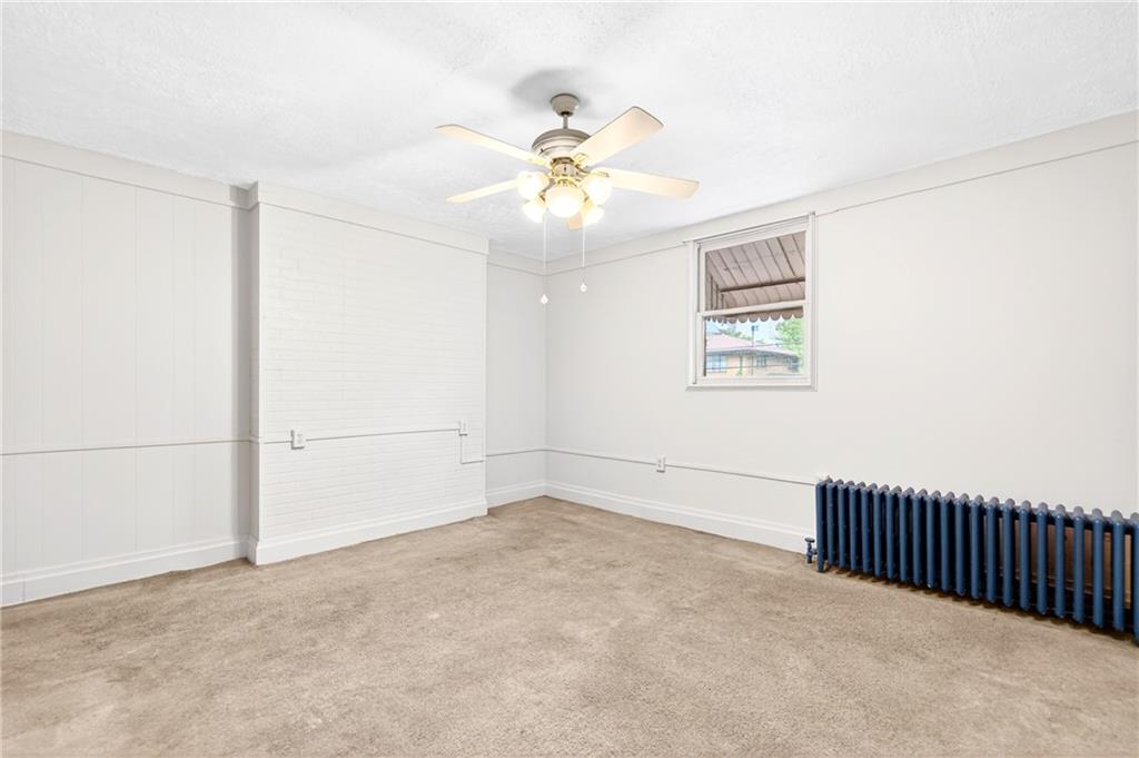520 Stokes Avenue Braddock, PA 15104 - Photo 17 of 47 a view of an empty room with a window