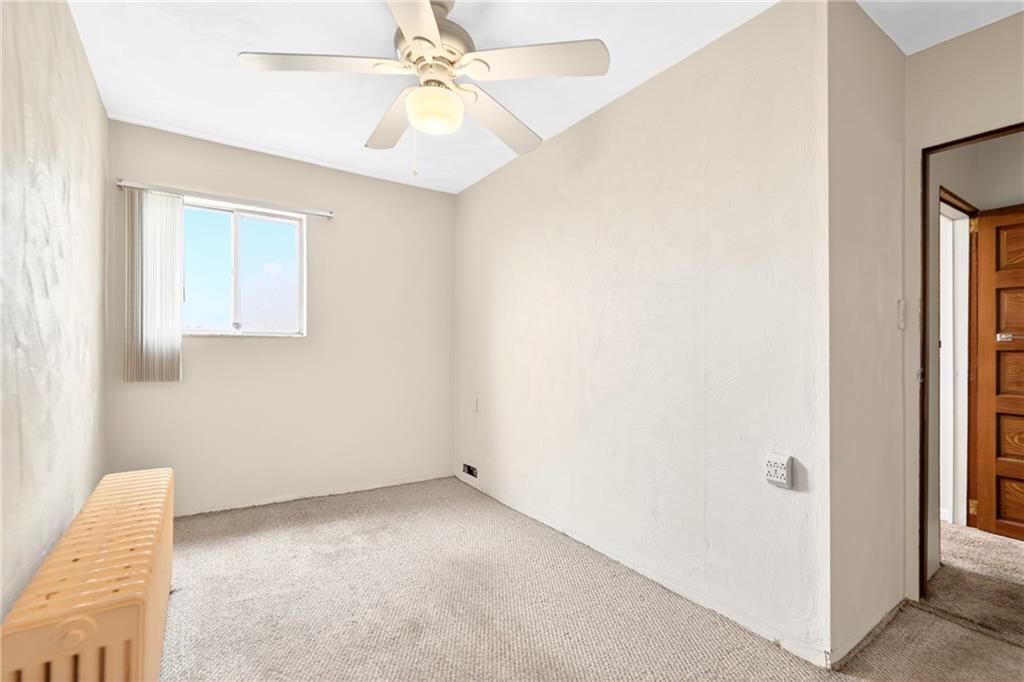 520 Stokes Avenue Braddock, PA 15104 - Photo 18 of 47 a view of a room with a fan and a window